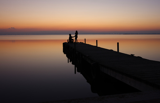 Romantic couple on pier