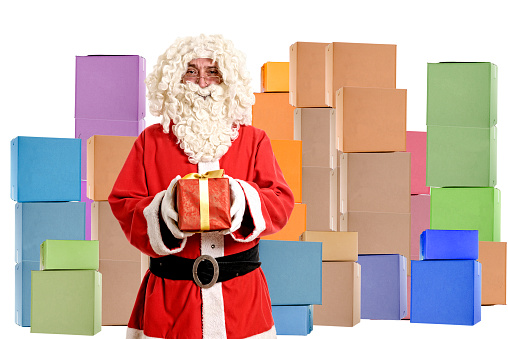 Santa Claus with packages on white background