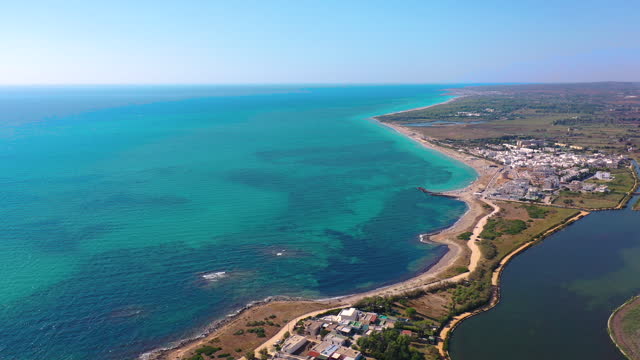 Aerial View of Paradise Beach with Turquoise Sea and Lake in City of Puglia, Italy