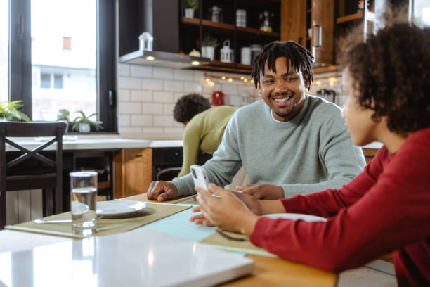 istock African American Father and his son talking at the table 1795087717