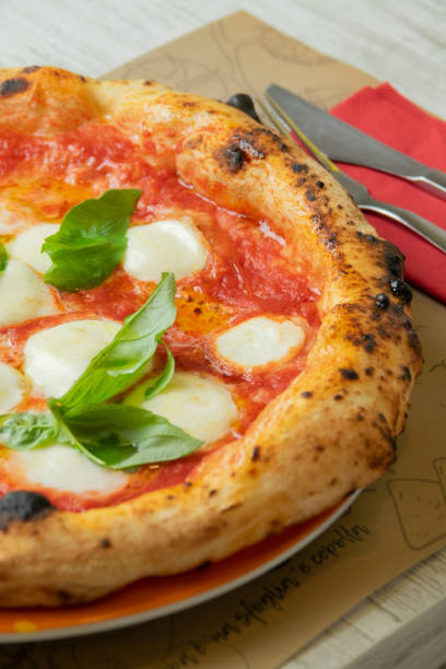 istock Traditional margherita pizza at the table 1795088318