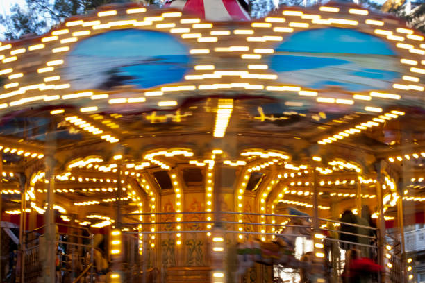 Close view of carved wooden horse head on round a bout carousel merry go round around in Europe.