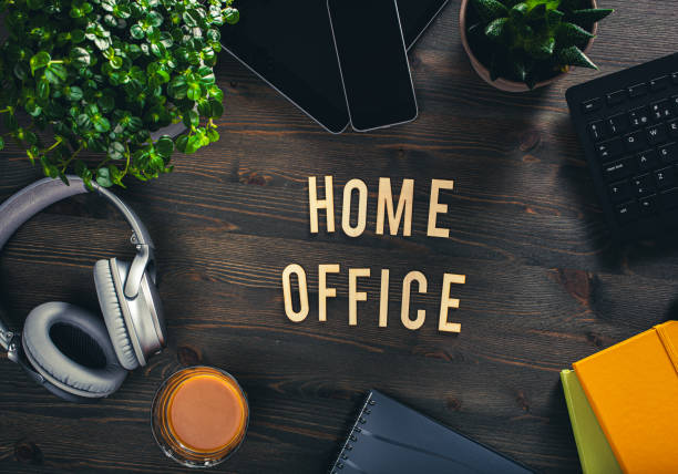 istock home office text desk with keyboard computer smartphone notebook houseplants, workspace office at home 1795135341