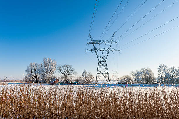 istock Electricity Pylon in Dutch winter landscape 179514671