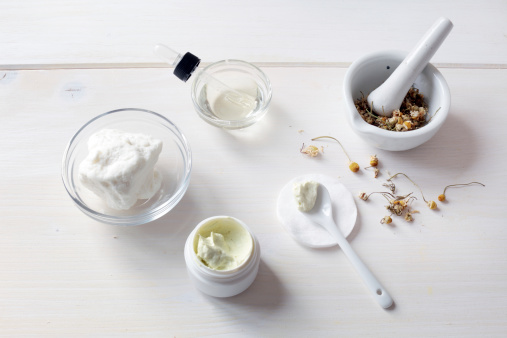 Organic homemade moisturizer with ingredients,  shea butter, atgan oil and chamomile essential oil.