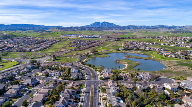 istock Aerial image over a golf course community in Brentwood 1795194988