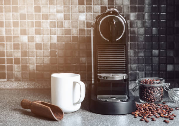 istock Morning kitchen sun light with espresso machine and coffee cup and raw beans on black background. 1795199273
