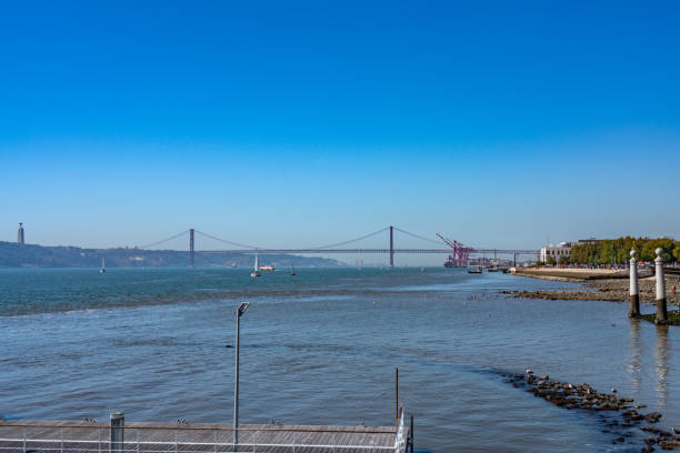 istock April 25th Bridge and Tagus river around Commerce Square, Lisbon, Portugal 1795210551