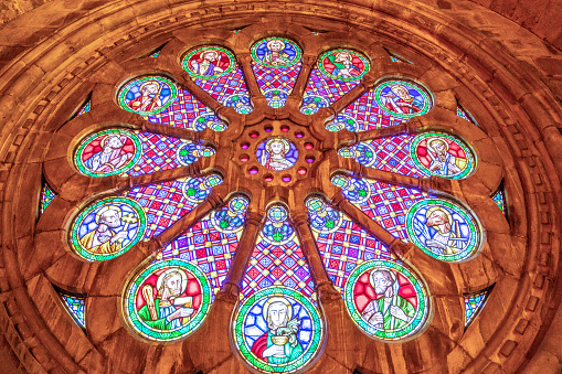 Spiral stained glass window ceiling from inside the prayer chapel of Thanksgiving Square in downtown Dallas, Texas.