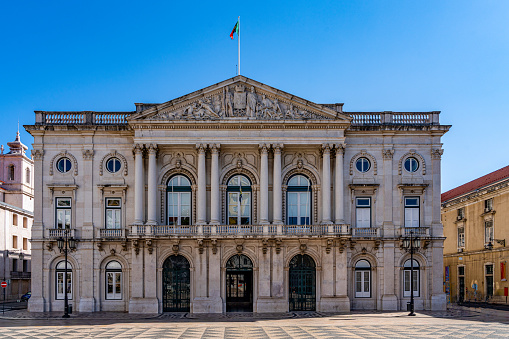 Madrid, Spain - July 10, 2022: The Teatro Real (Royal Theatre) is an opera house located at the Plaza de Oriente, opposite the Royal Palace. It is considered the top institution of the performing and musical arts in the country and one of the most prestigious opera houses in Europe.