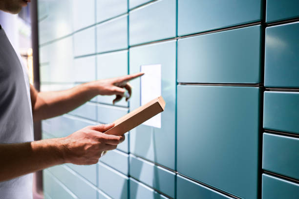 istock Locker parcel service. Package delivery to post mail box machine. Packet automat in postal office. Man using touchscreen. Pick up at storage. 1795222025