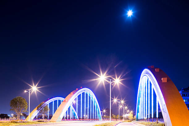 istock arch bridge with neon lamp 179523082