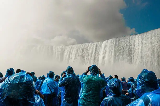 Photo of People under Niagara Falls