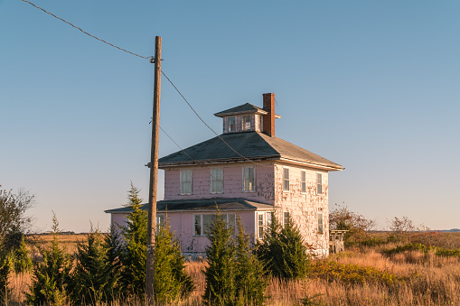 Abandoned Pink House near Plum Island and Newburyport Massachusetts is a beloved local landmark