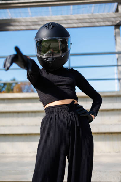 istock Modern Edge: Stylish Brunette in Biker Attire 1795248625