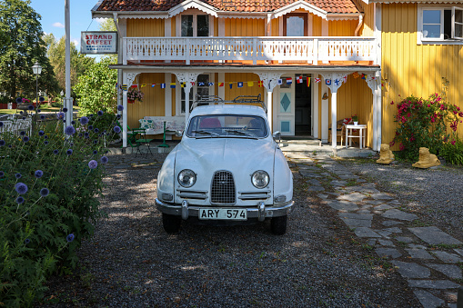 Trosa, Sweden - July 29, 2023: Saab 93 B de luxe, model year 1959, parked in front of a house in Trosa, Sweden