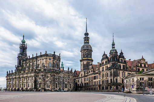 Dresden, Germany - May 14, 2023: The Dresden Cathedral Hofkirche and the Dresden Castle Residenzschloss in Dresden, Saxony in Germany.