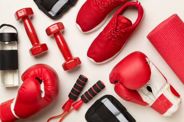 istock Red sport equipment on concrete background, top view 1795331649