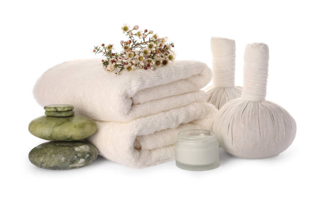 istock Beautiful spa composition with different care products and flowers on white background 1795340216