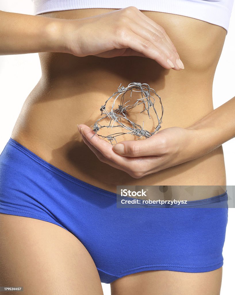 Symbolic suffering. Female genital pain. Adult Stock Photo