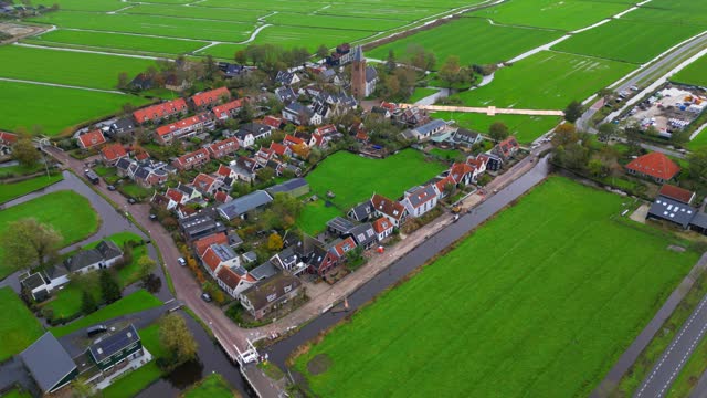 Fixed drone aerial of typical Dutch village Zunderdorp North Holland