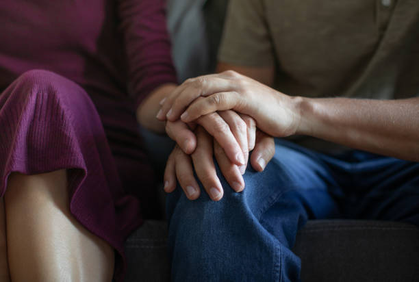 istock Men giving a helping hand to his wife. 1795356415