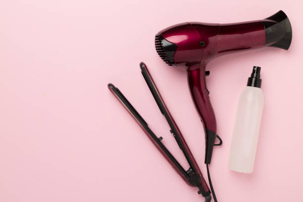 istock Hair tools with thermo protection on color background, top, view 1795364362