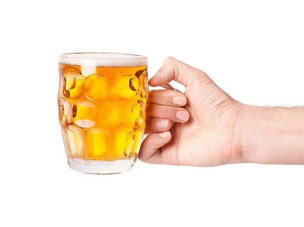 istock mug of beer in hand 179536946