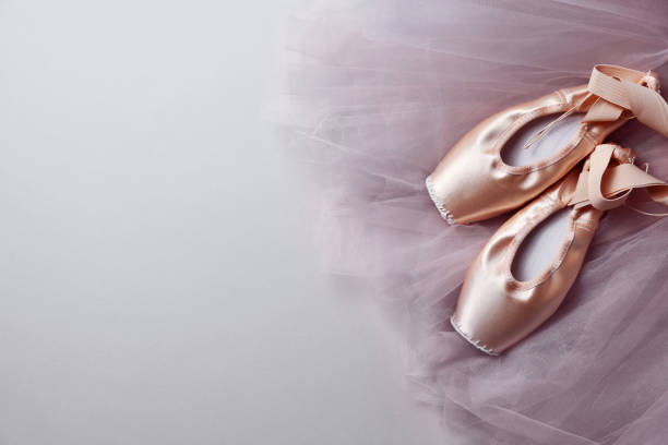 istock Ballet shoes. Elegant pointes and tutu on light grey background, top view. Space for text 1795378103