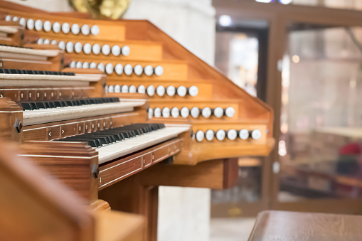Musical instrument in cathedral, organ, view of keyboards and buttons