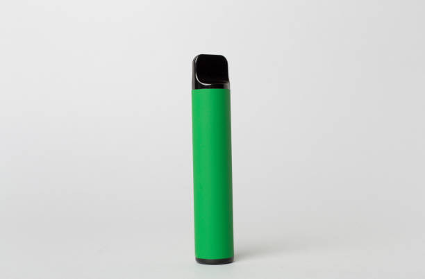 istock Disposable electronic cigarette on color background 1795383133