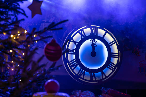 istock neon light decorative lighting clock with roman numerals, new year event decoration, lspotlight lights 1795402189