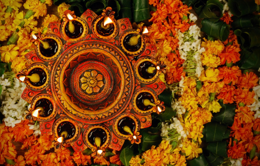 Plate of enligtened diyas - concept of prayer and celebrations