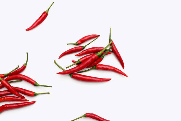 istock Red chili peppers on white background 1795441838