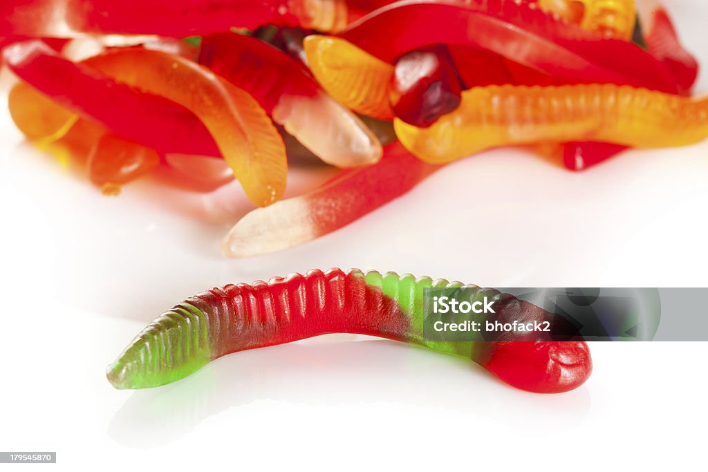 Colorful Fruity Gummy Worm Candy Colorful Fruity Gummy Worm Candy on a background Candy Stock Photo