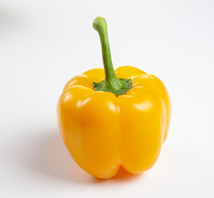 Yellow bell pepper on isolated background.