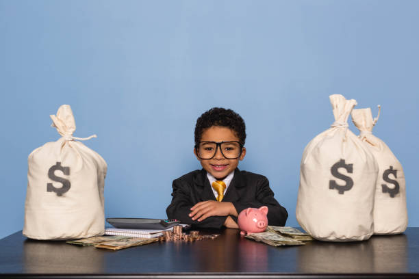 istock Young Business Boy with Money Savings 1795475623