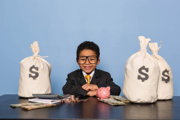 istock Young Business Boy with Money Savings 1795475637