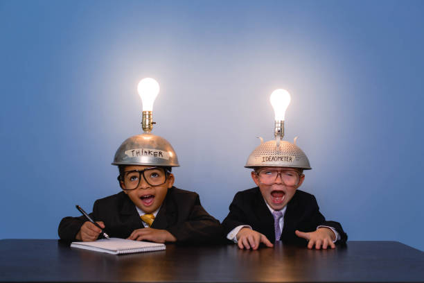 istock Young business nerd boys with Idea Helmets 1795475645