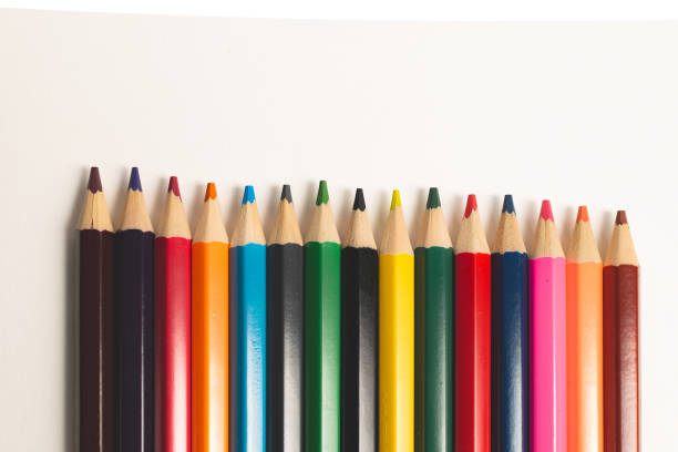 istock Background with colored pencils. Crayons on a white background, objects for children to paint 1795480491