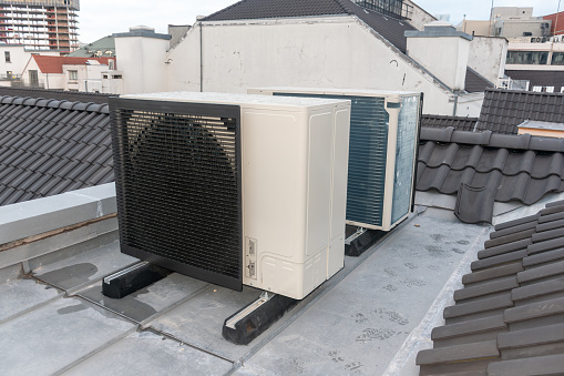 Air conditioning installed on the roof of a tall building,Air conditioning, heat pump