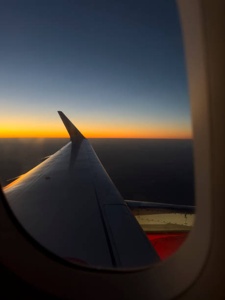 istock Airplane window view of dawn 1795483210
