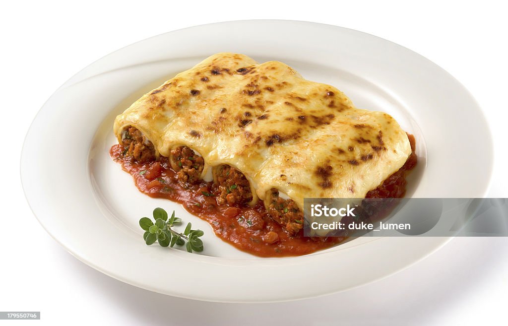 Pasta Cannelloni delicious cannelloni on a white plate, with path Cannelloni Stock Photo