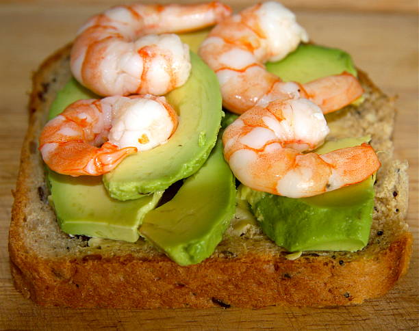 istock Prawns and avocado on toast 179554240