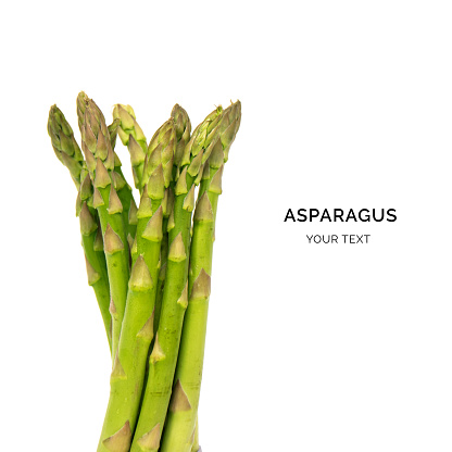 Creative layout made of asparagus on the white background. Food concept.