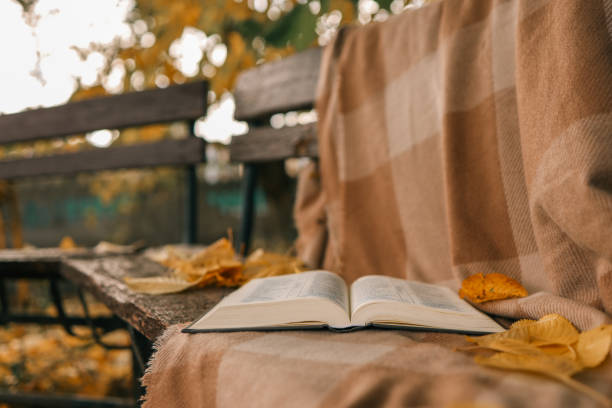 istock Open Bible on a blanket, autumn 1795573602
