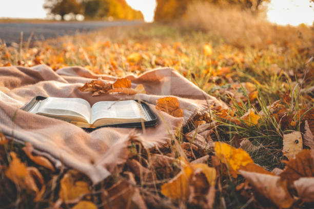 istock Open Bible on a blanket, autumn 1795574354