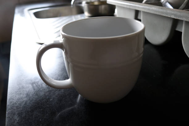 istock White photo of a cup on the kitchen 1795596227