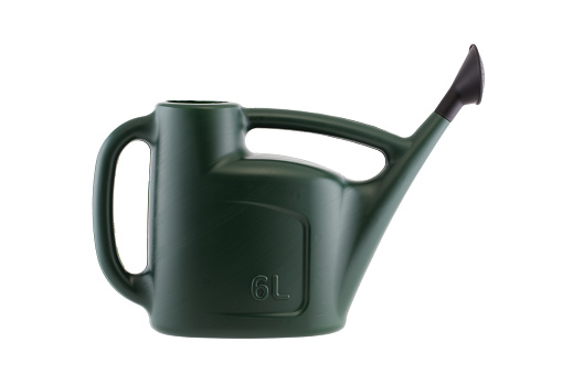 Green watering can side view isolated on white with clipping path