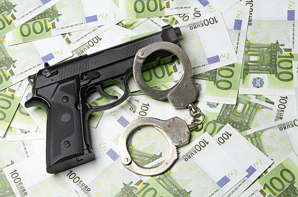 istock Image of the old gun and money 179565667